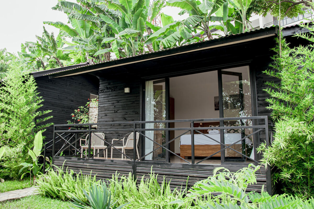 Garden chalet exterior at our partner lodge on Lake Kivu